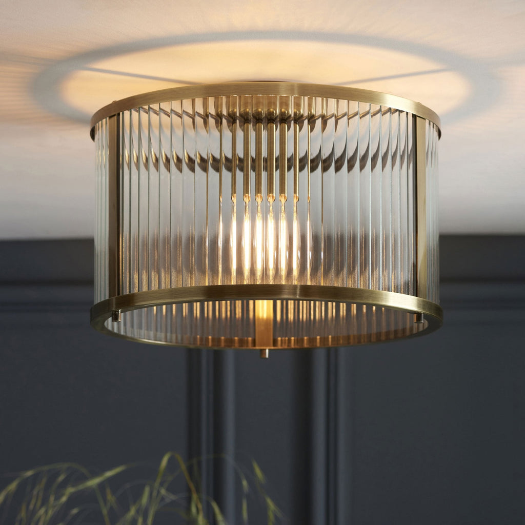 Aurelis – Antique Brass Flush Clear Glass Ceiling Light