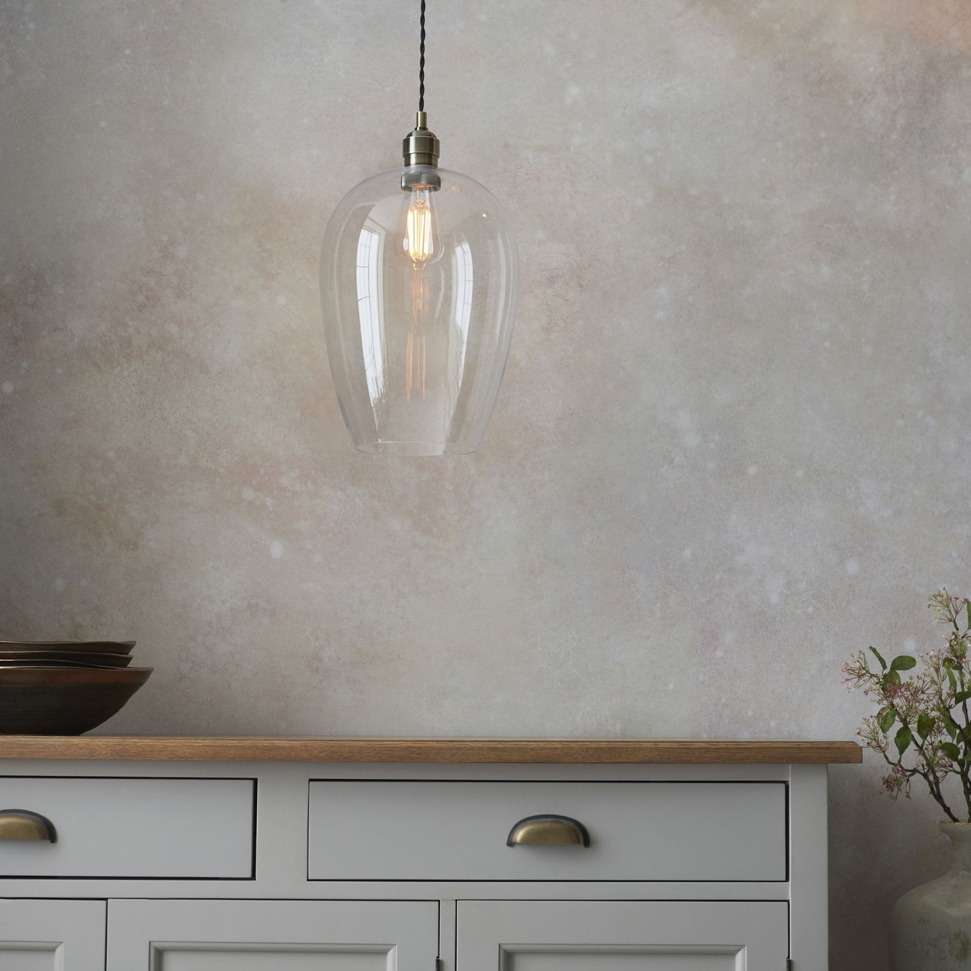 Aurelis – Antique Brass Pendant Light with Clear Glass Bezel