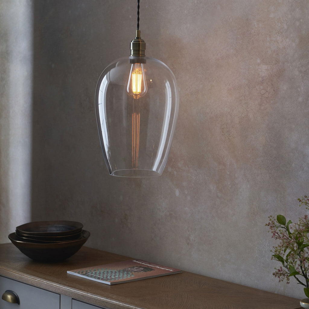 Aurelis – Antique Brass Pendant Light with Clear Glass Bezel