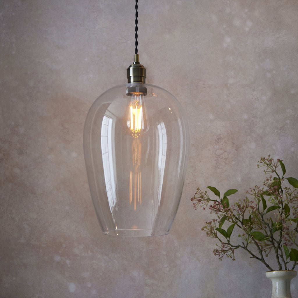 Aurelis – Antique Brass Pendant Light with Clear Glass Bezel