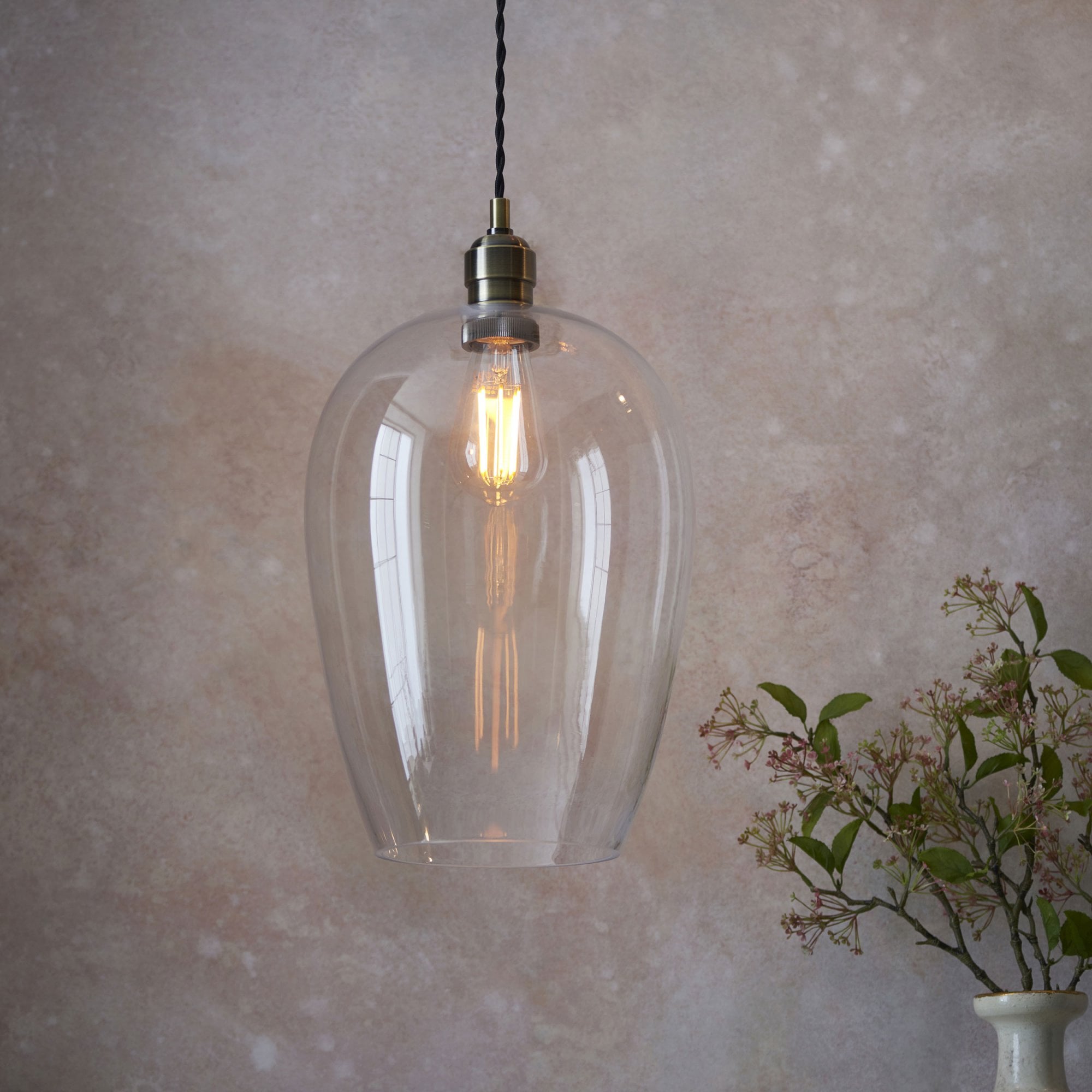 Aurelis – Antique Brass Pendant Light with Clear Glass Bezel