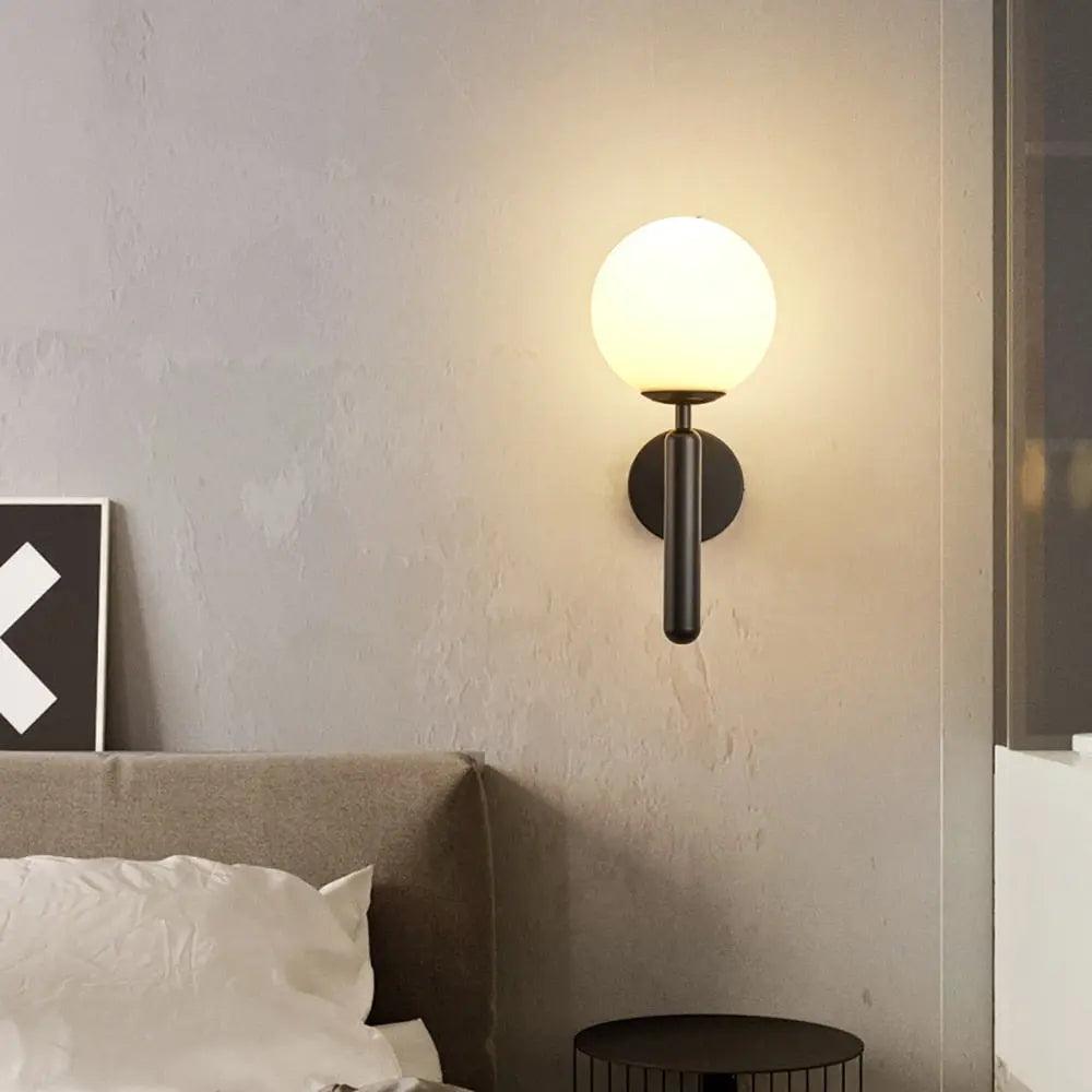 Aurelis – Gold Metal Wall Sconce with Glass Shade