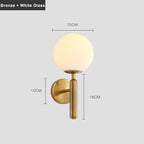 Aurelis – Gold Metal Wall Sconce with Glass Shade