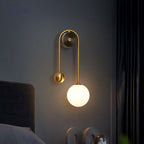 Aurelis – Gold Wall Sconce with White Glass Shade