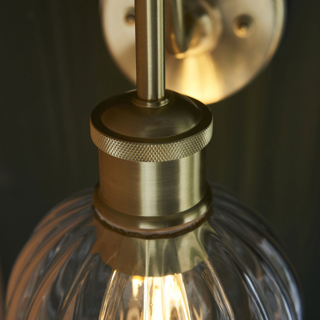 Virello – Satin Brass Wall Light with Ribbed Glass Shade