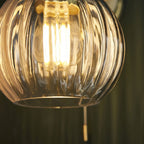 Virello – Satin Brass Wall Light with Ribbed Glass Shade