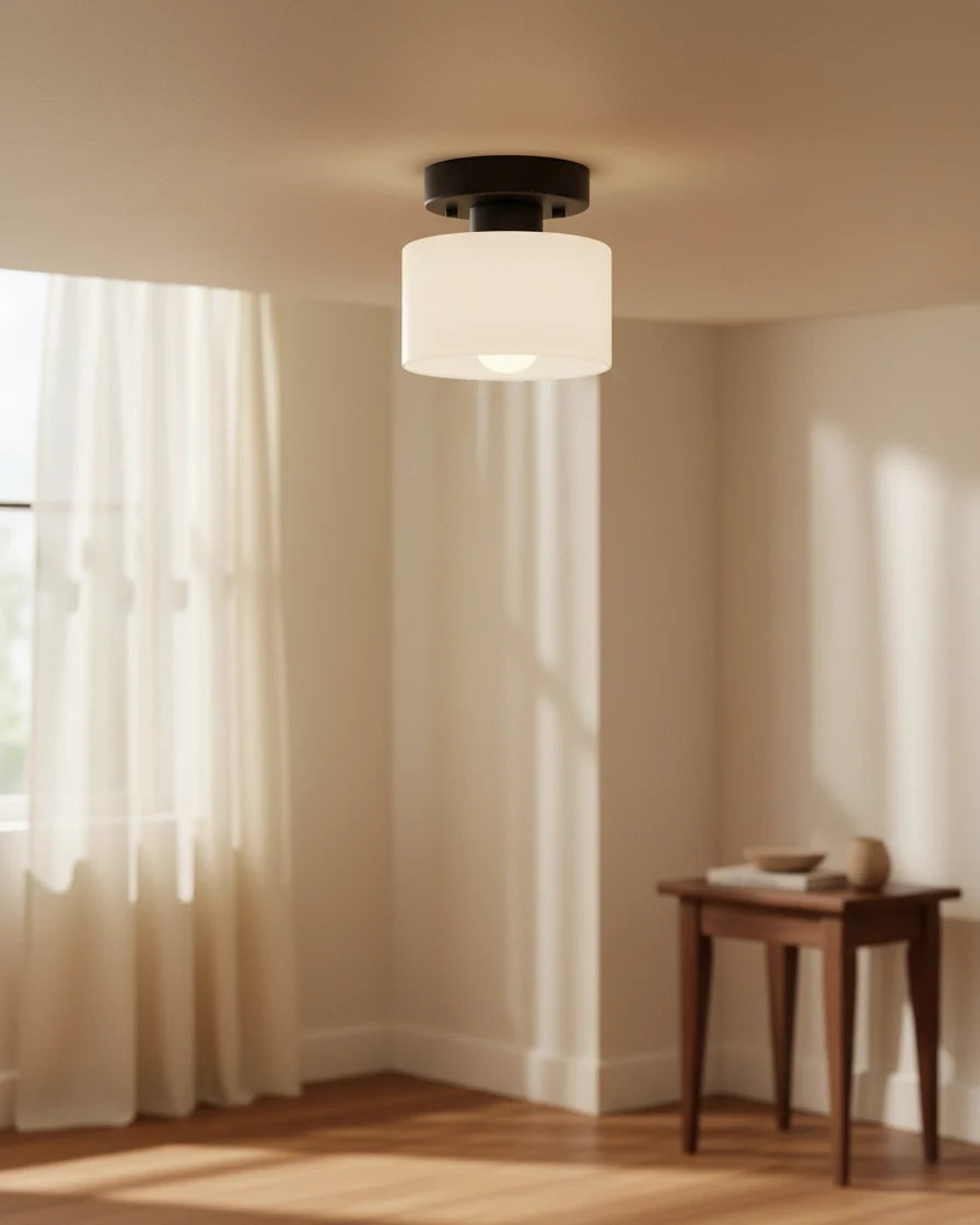 Aurelis round glass plafond in warm orange, flush mounted on a white ceiling, softly lit - White